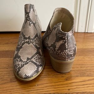 Barely worn dolce vita booties in grey snake skin patern size 12
